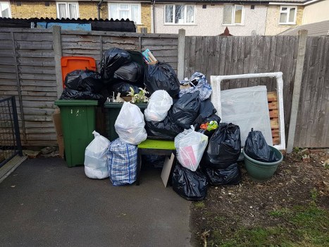 Workers performing loft clearance in Sidcup home