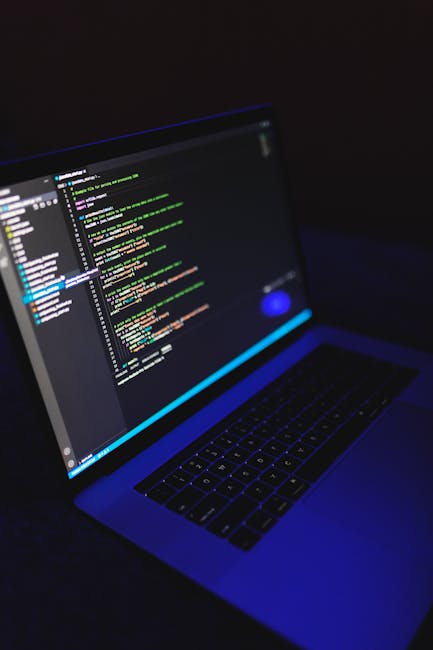A close-up photograph of a computer screen displaying lines of code with multicolored syntax, including HTML tags and image file references. The code appears to be part of a web development project, w